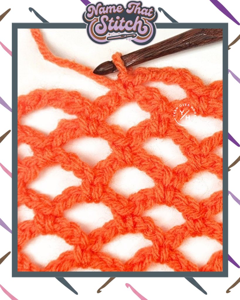 Close-up of a crocheted fabric displaying a repeating stitch pattern worked in an orange yarn, featured as part of the Name That Stitch daily crochet puzzle. View more at NameThatStitch.com