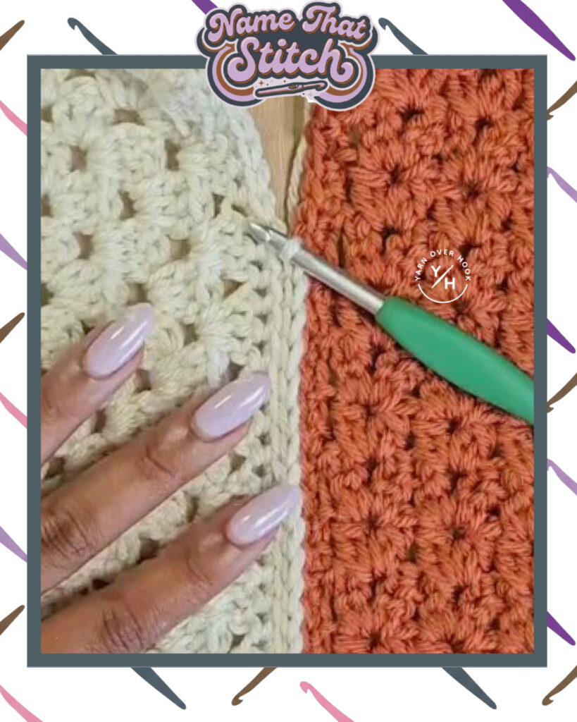 Close-up of two textured crochet swatches side by side—cream on the left and rust on the right—with a green-handled crochet hook pointing between them and a hand with pale lavender nails resting on the cream fabric for a Name That Stitch puzzle. View more at NameThatStitch.com.
