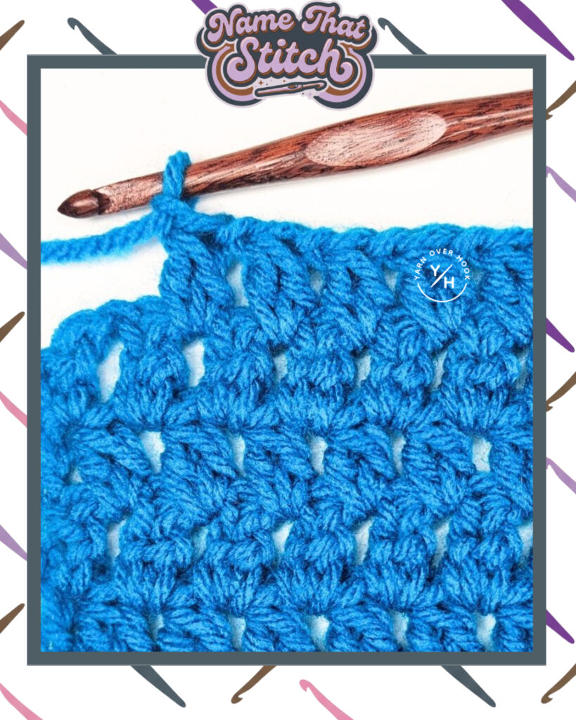 Close-up of a crocheted fabric displaying a repeating stitch pattern worked in vibrant blue yarn, with a wooden crochet hook and featured as part of the Name That Stitch daily crochet puzzle. View more at NameThatStitch.com