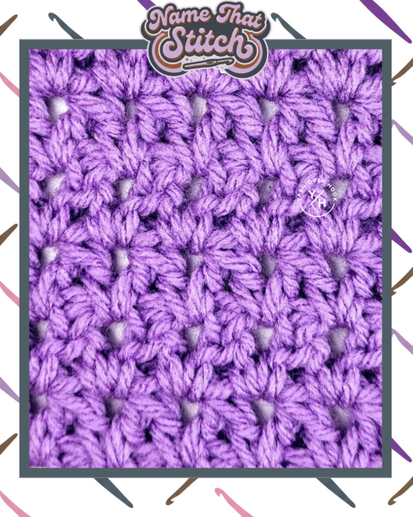 Close-up of a crocheted fabric displaying a repeating stitch pattern worked in purple yarn and featured as part of the Name That Stitch daily crochet puzzle. View more at NameThatStitch.com