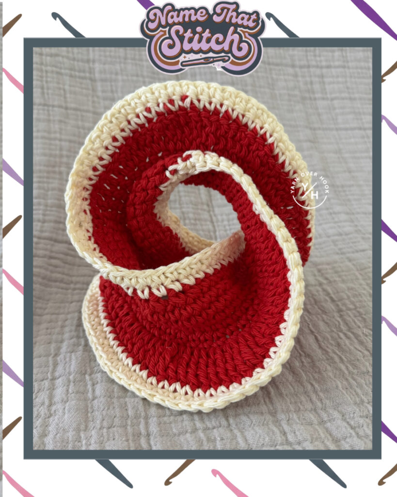 Name That Stitch game card showing a red and cream crochet piece folded into flowing curved loops to highlight the stitch texture and structure with Yarn Over Hook branding. View more at NameThatStitch.com