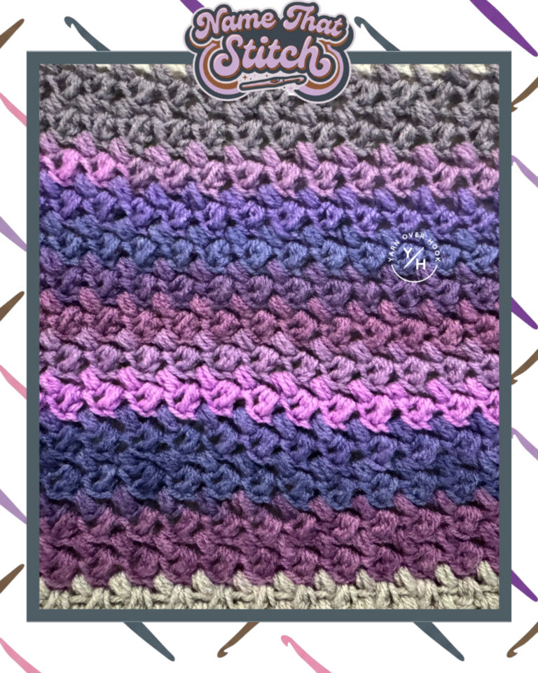 Close-up of a crocheted fabric displaying striped rows of textured stitches worked in gray, purple, pink, and blue yarn, featured as part of the Name That Stitch daily crochet puzzle. View more at NameThatStitch.com