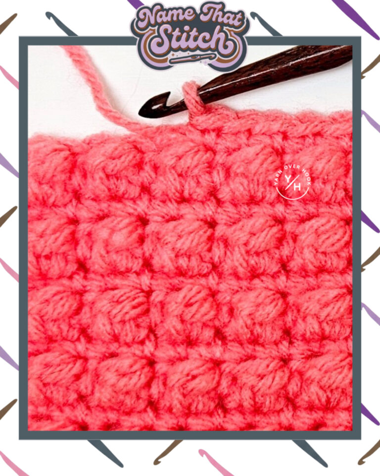 Close-up of a crocheted fabric displaying a repeating stitch pattern worked in peach colored yarn, with a wooden crochet hook and featured as part of the Name That Stitch daily crochet puzzle. View more at NameThatStitch.com