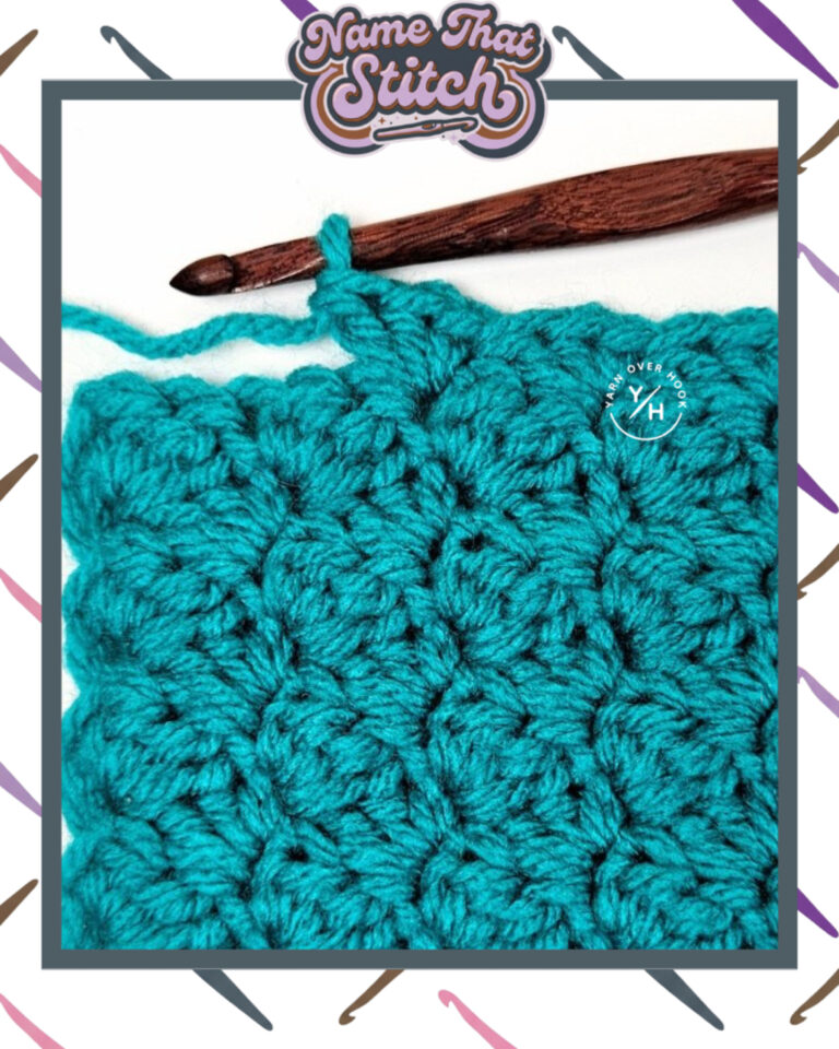 Close-up of a crocheted fabric displaying a repeating stitch pattern worked in aqua blue colored yarn, with a wooden crochet hook and featured as part of the Name That Stitch daily crochet puzzle. View more at NameThatStitch.com